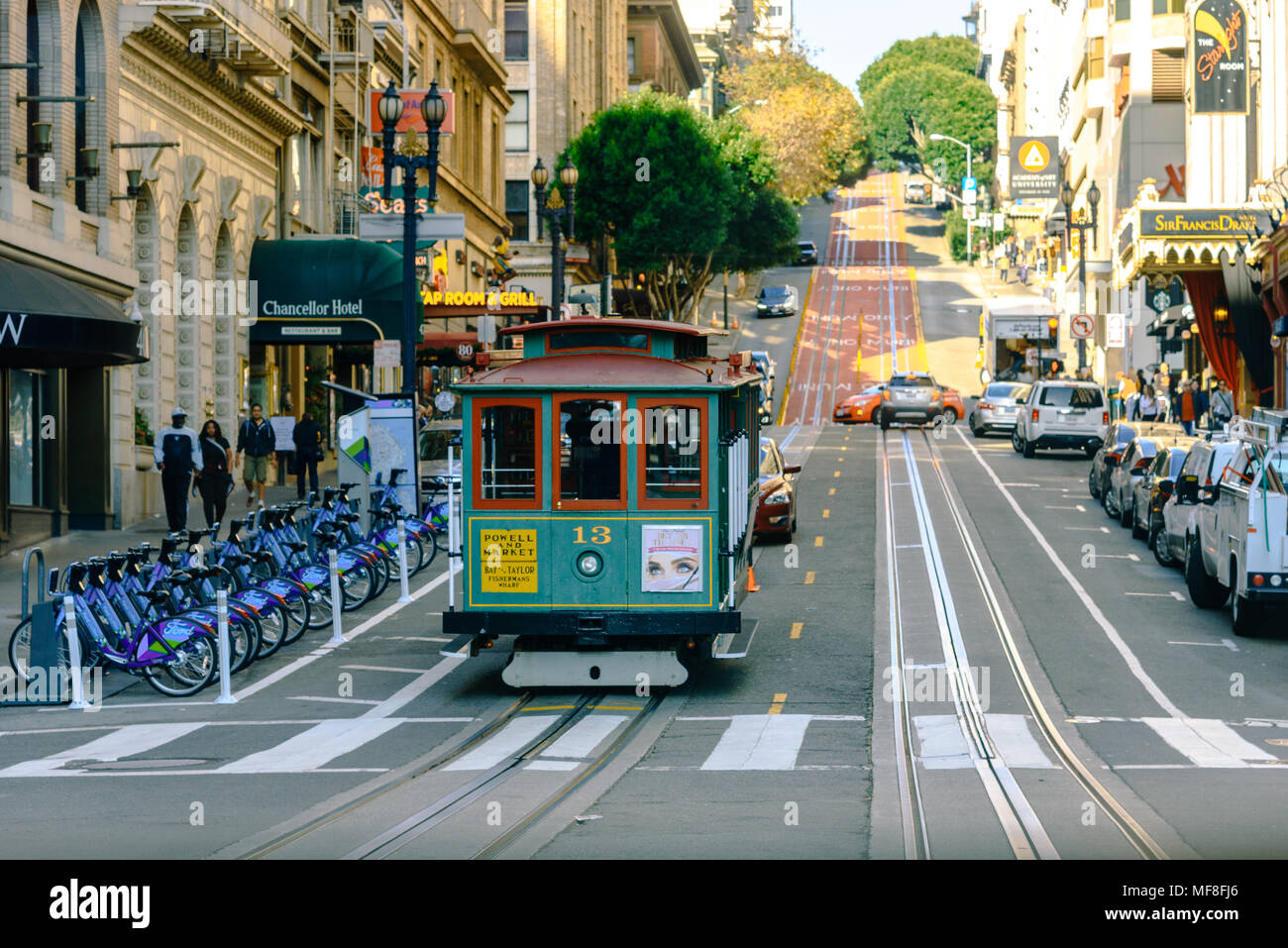 A San Francisco cable car from the Powell-Hyde Line pulling in to Market Street on Powell Street Stock Photo