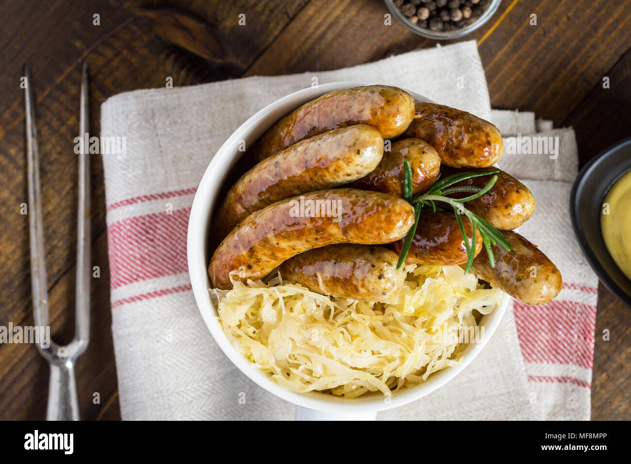 Traditional German Sausages with Cabbage Salad, Mustard and Beer