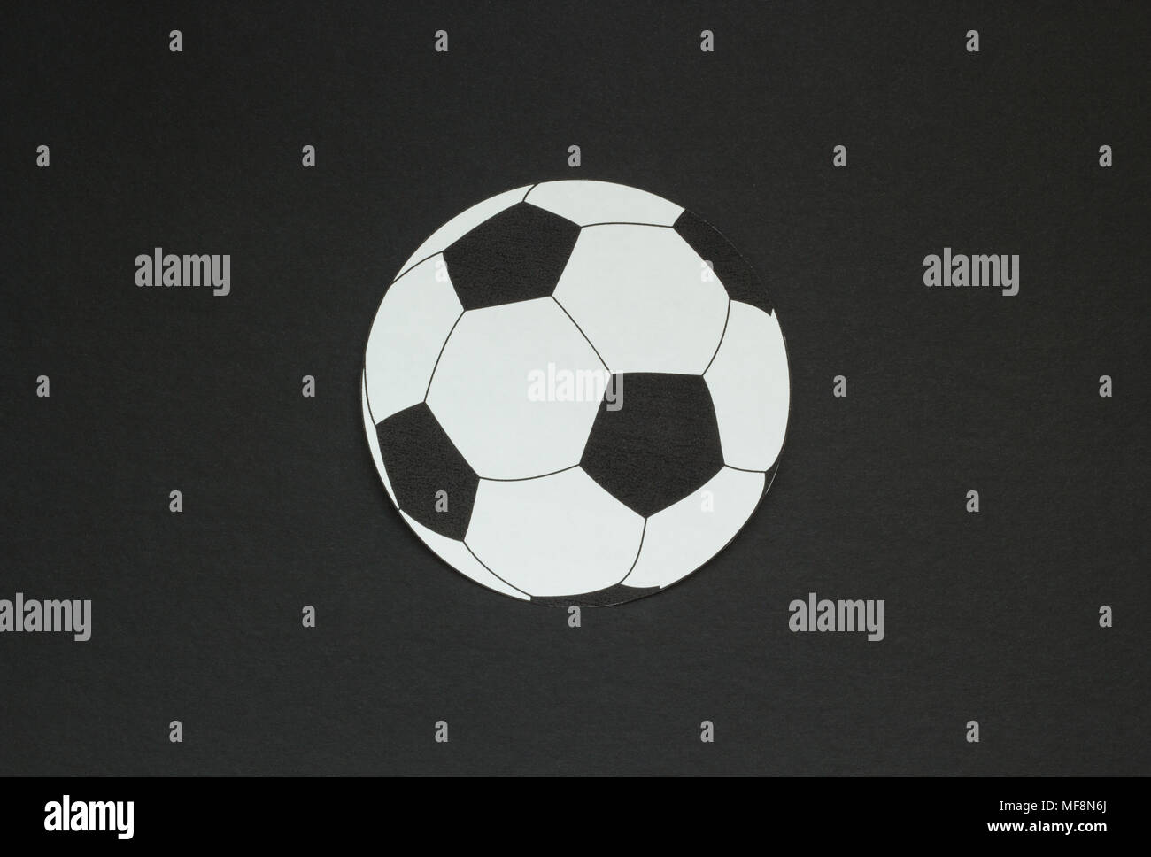 old soccer ball isolated on black background Stock Photo - Alamy