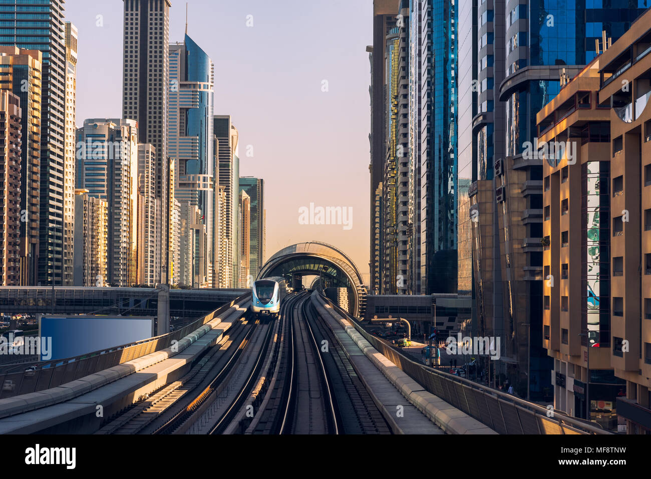 Dubai's downtown architecture with metro monorail train Stock Photo