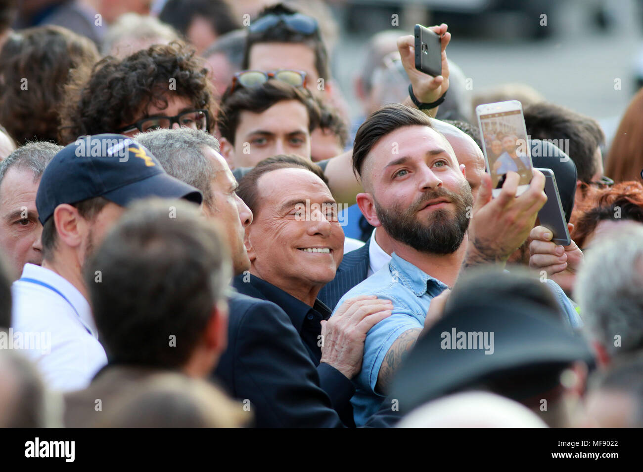 Pordenone, Italy. 24th April 2018. ITALY, Pordenone: Silvio Berlusconi, leader of the Forza Italia party, makes a selfie with fan during electoral campaign for the upcoming regional election in visit to Friuli Venezia Giulia Region on 24th April, 2018. Credit: Andrea Spinelli/Alamy Live News Stock Photo