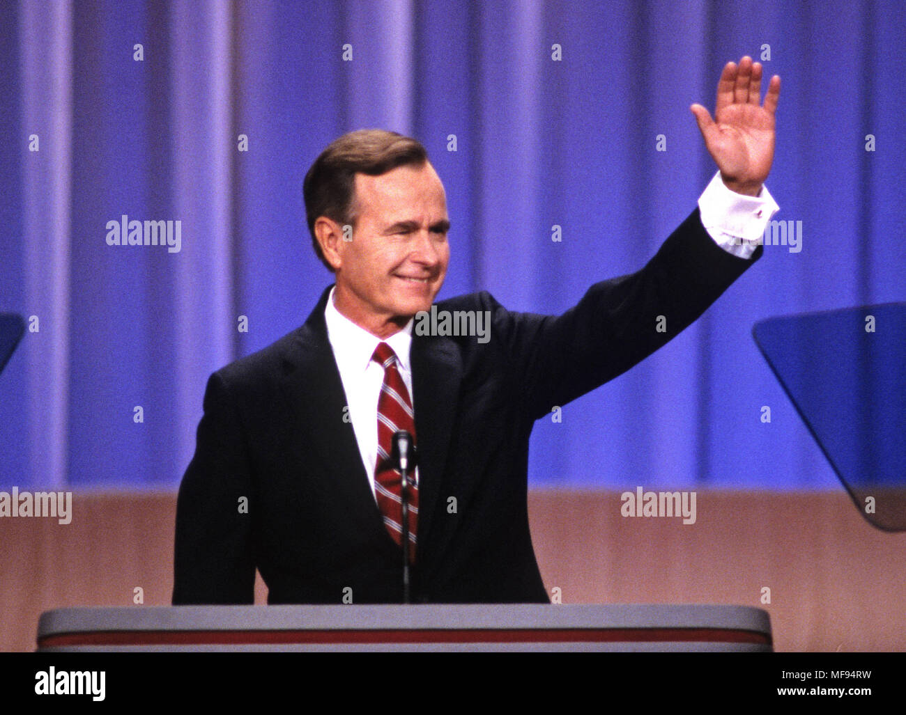 New Orleans, Louisiana, USA. 18th Aug, 1988. United States Vice President GEORGE H.W. BUSH waves to the crowd from the podium as he delivers his speech accepting his party's nomination for President of the United States at the 1988 Republican Convention at the Super Dome in New Orleans, Louisiana in 1988. Credit: Arnie Sachs/CNP/ZUMAPRESS.com/Alamy Live News Stock Photo
