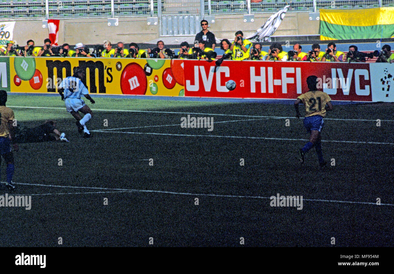 FIFA World Cup - Italia 1990 24.6.1990, Stadio Delle Alpi, Turin, Italy. Round of 16 match Brazil v Argentina. The winning goal of Argentina 1: Claudio Caniggia scores with Taffarel beaten. NOTE: THE ORIGINAL SLIDE WAS BADLY UNDEREXPOSED - THE APERTURE RING HAD ACCIDENTALLY BEEN SWITCHED TO 22 - THE SMALLEST - WITH SPEED 500 AND KODACHROME 64 ASA FILM. Stock Photo