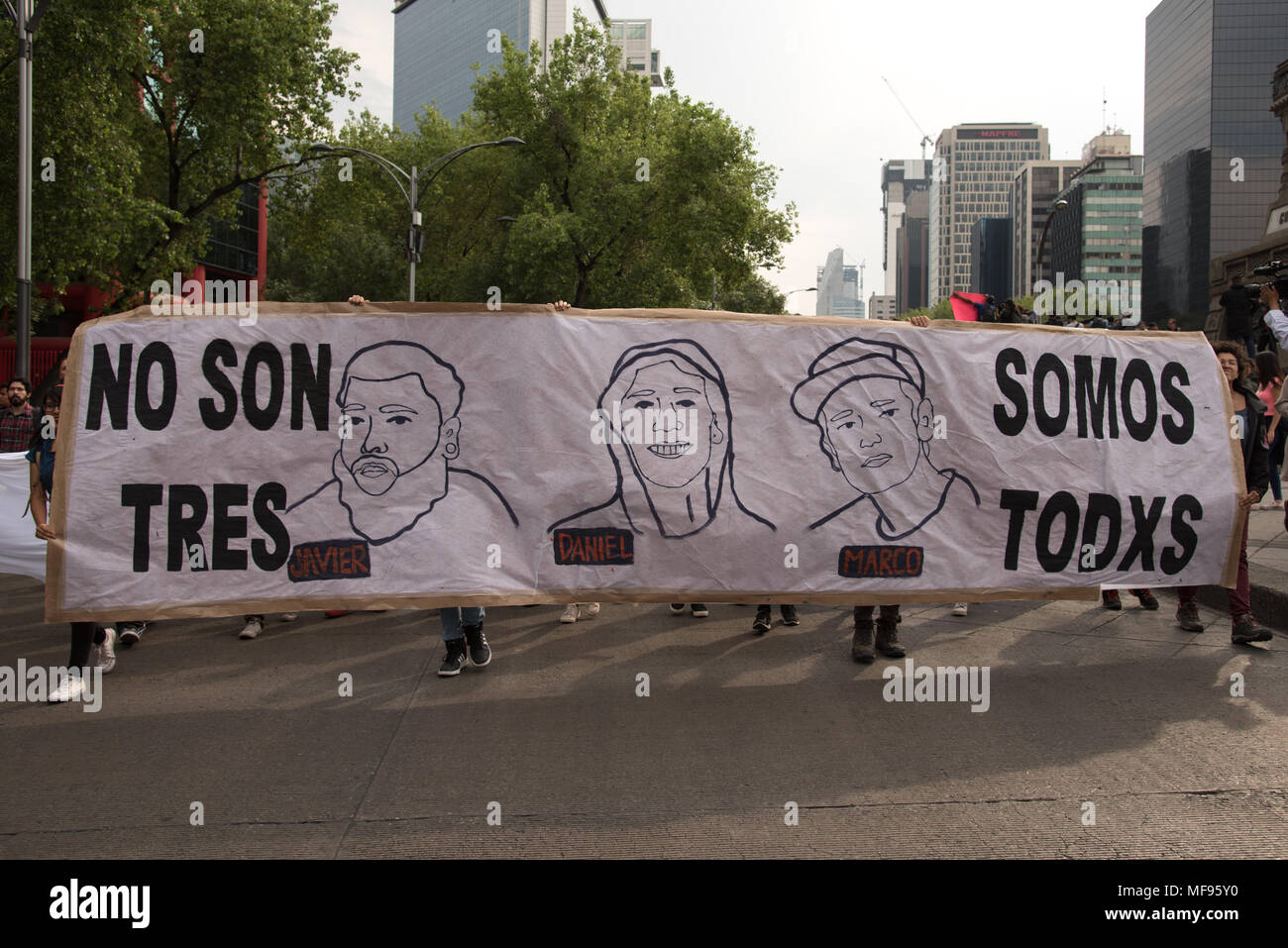 Mexico City, Mexico. 24th April, 2018.  Hundreds of students rallied in Mexico City to ask for justice in the case of the killing of three film students in Guadalajara, Mexico. The banner reads 'No son tres, somos todxs' ('It is not three , it is everyone'). Credit: Miguel A. Aguilar-Mancera/Alamy Live News Stock Photo