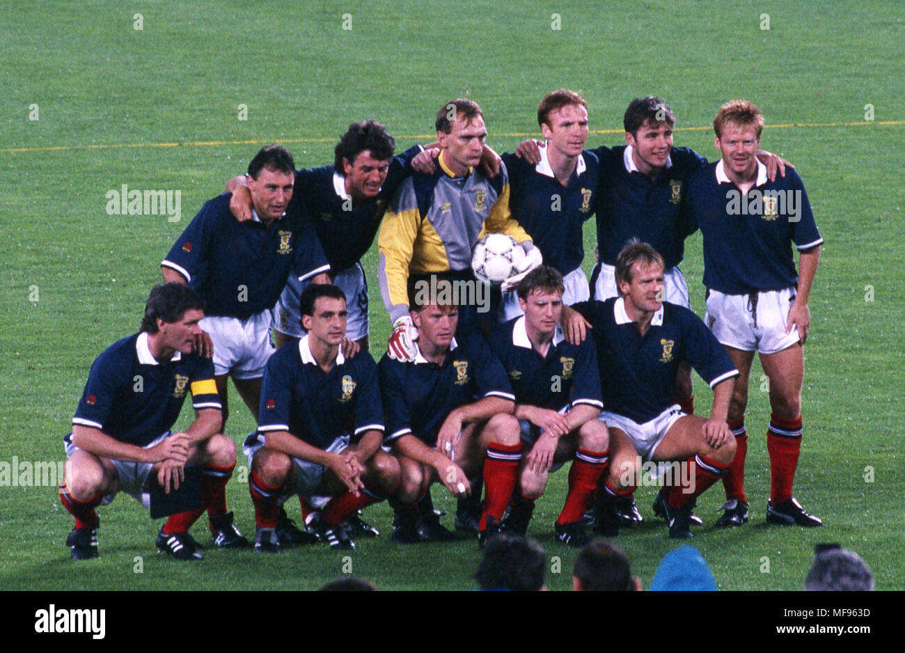 FIFA World Cup - Italia 1990 20.6.1990, Stadio Delle Alpi, Turin, Italy. Brazil v Scotland. Scotland starting XI, standing from left: Maurice Malpas, David McPherson, Jim Leighton, Alex McLeish, Ally McCoist, Mo Johnston. Kneeling: Roy Aitken, Paul McStay, Stuart McCall, Stewart McKimmie, Murdo McLeod. Stock Photo