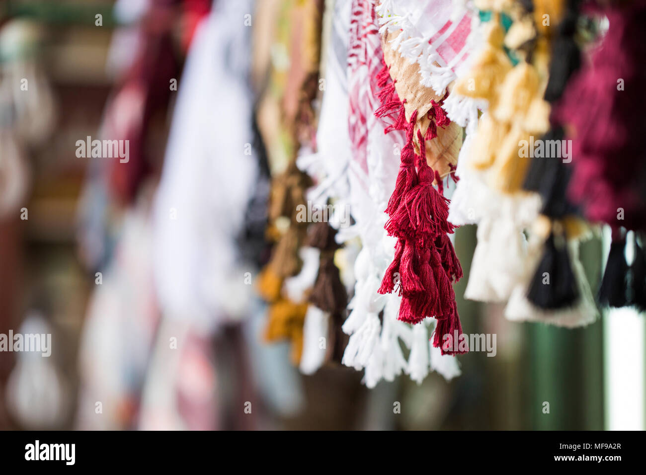 Traditional Arab Ghutra on sale in a souq in Kuwait City Stock Photo