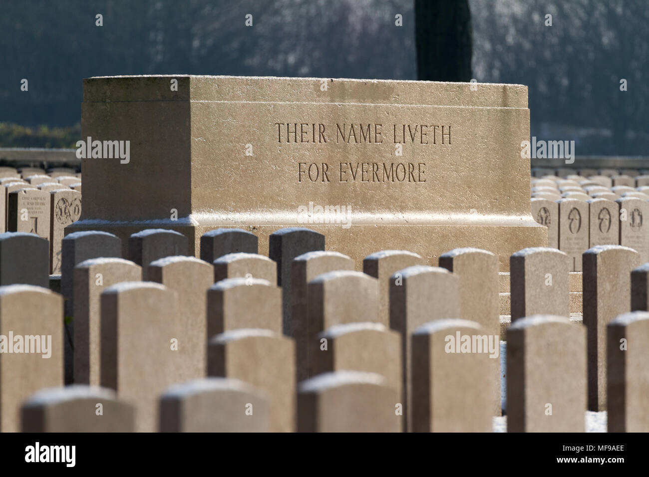 The Stone of Remembrance at the Commonwealth War Graves Commissions (CWGC) Brown's Copse Cemetery in Northen France on a snowy winters morning. Stock Photo