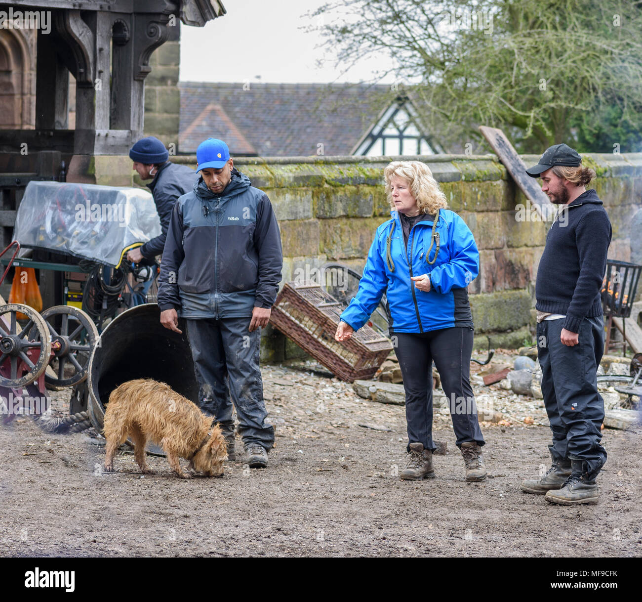 Great Budworth, UK. 11th April, 2018. Director Craig Viveiros and dog trainer preparing to shoot a scene on the set in the new BBC drama 'War Of The W Stock Photo