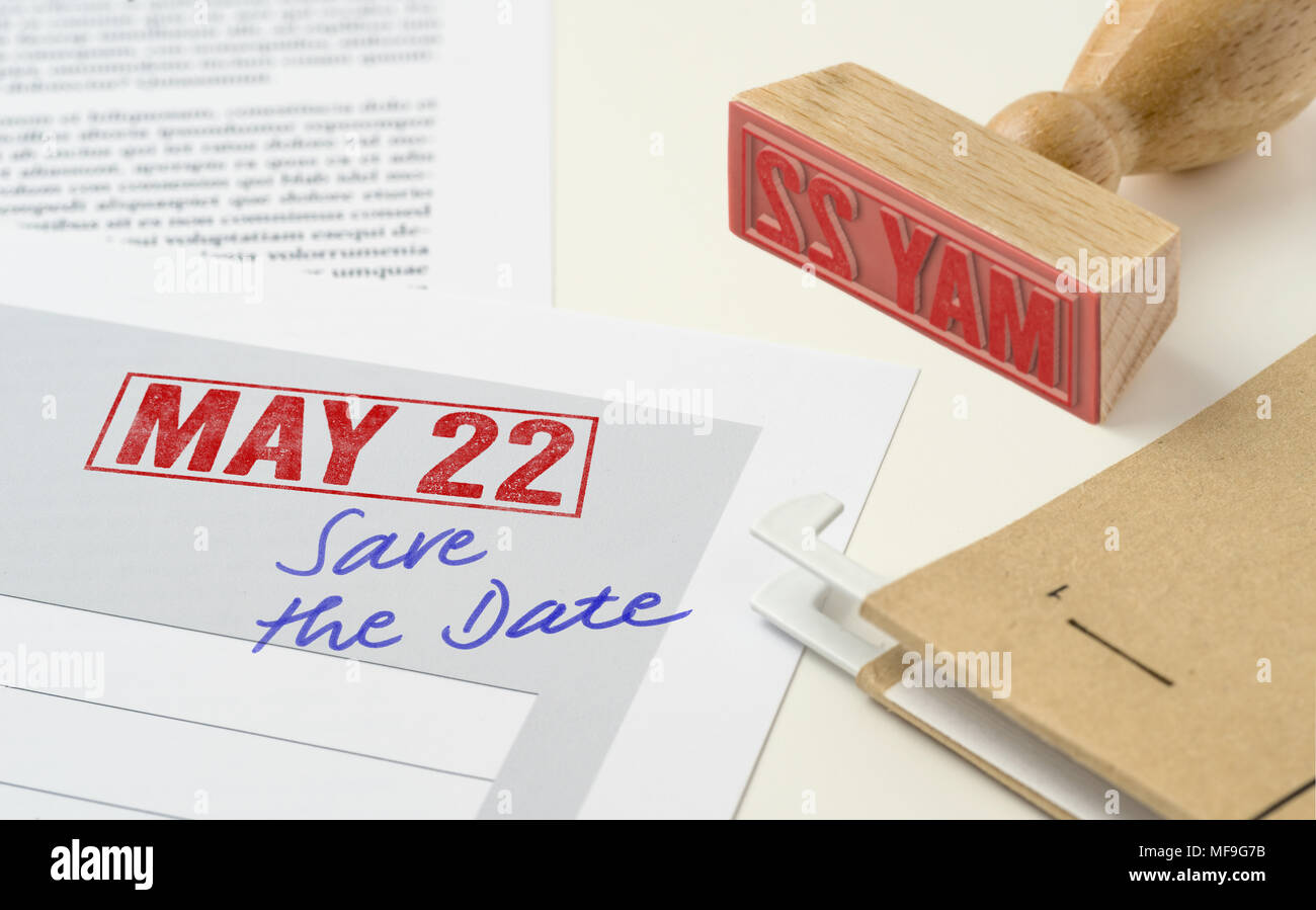 A red stamp on a document - May 22 Stock Photo