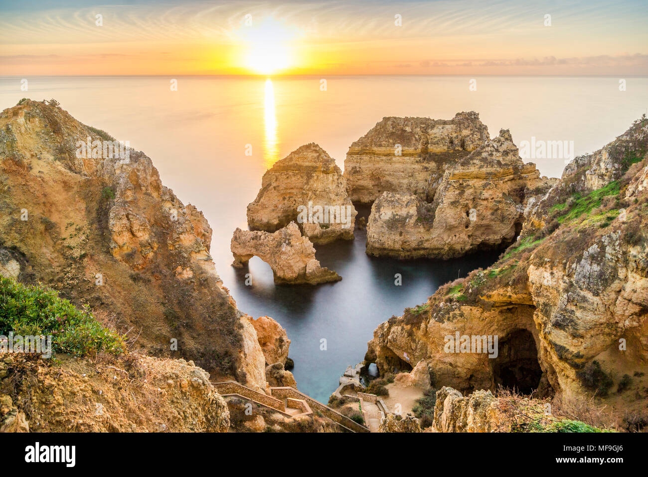 Stunning cliffs and arches in Ponta da Piedade in the early morning, Lagos, Algarve, Portugal Stock Photo