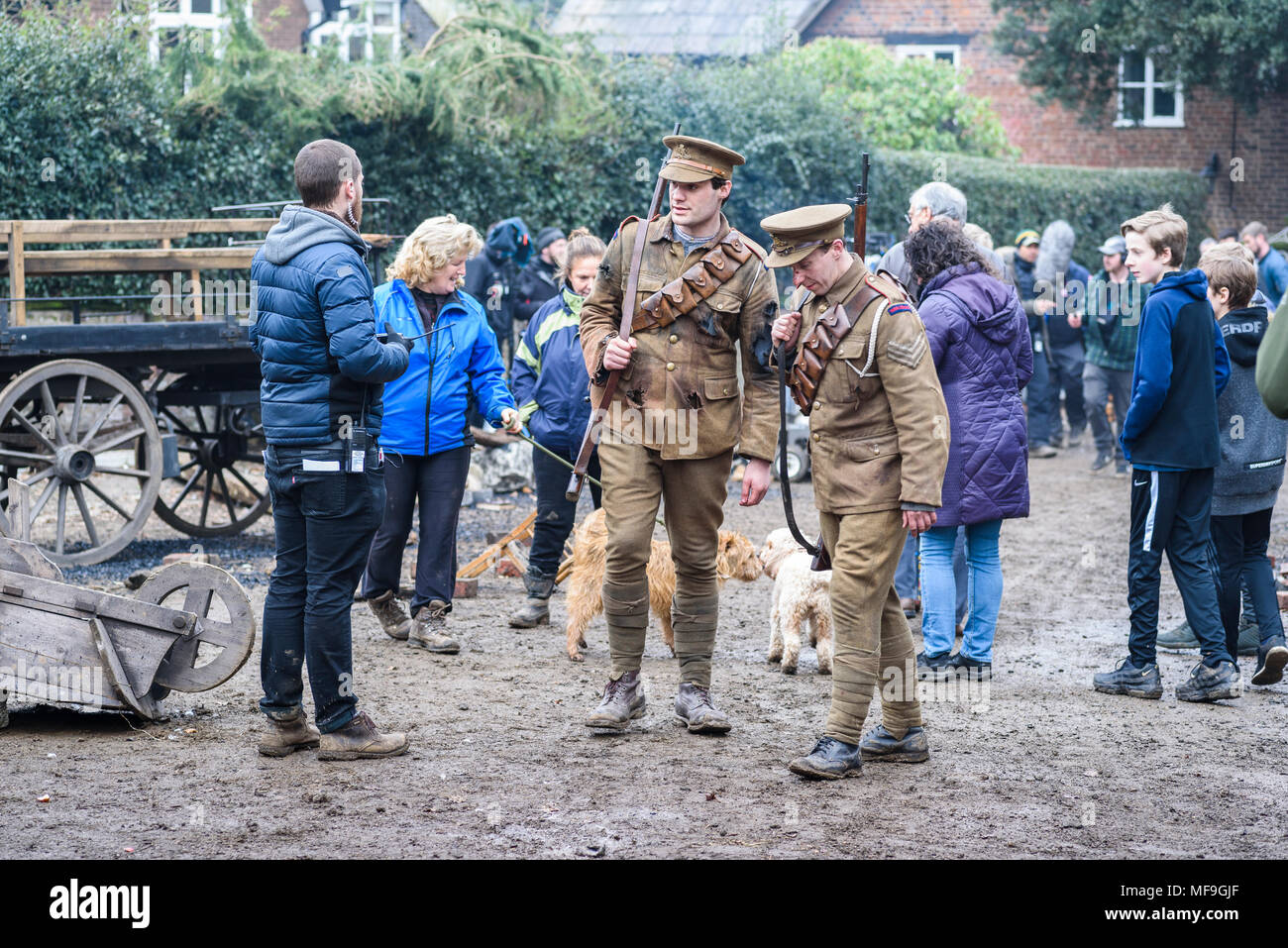Great Budworth, UK. . extras dressed in Royal Artillery costumes and dog trainer between scenes making the new BBC drama 'War Of The Worlds Stock Photo