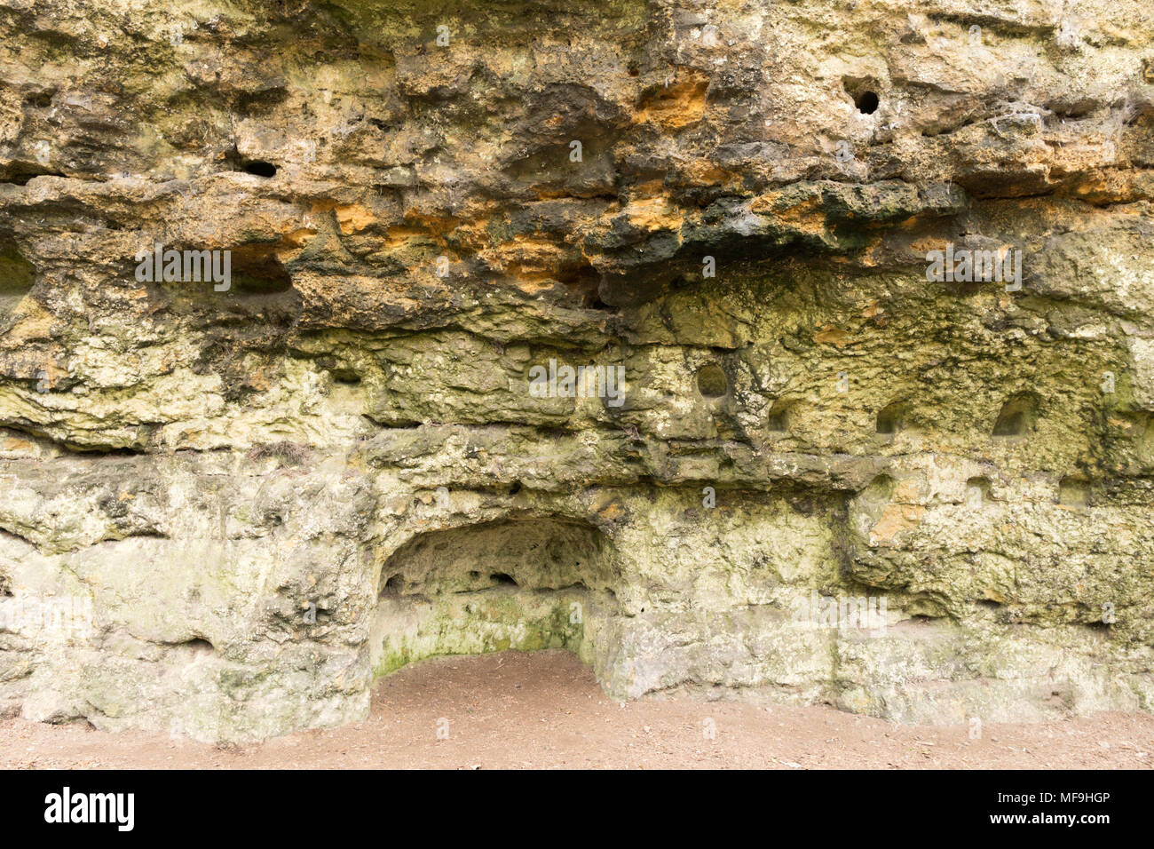 Excavation into the cliff face below the castle, Knaresborough, North Yorkshire, England, UK. Stock Photo
