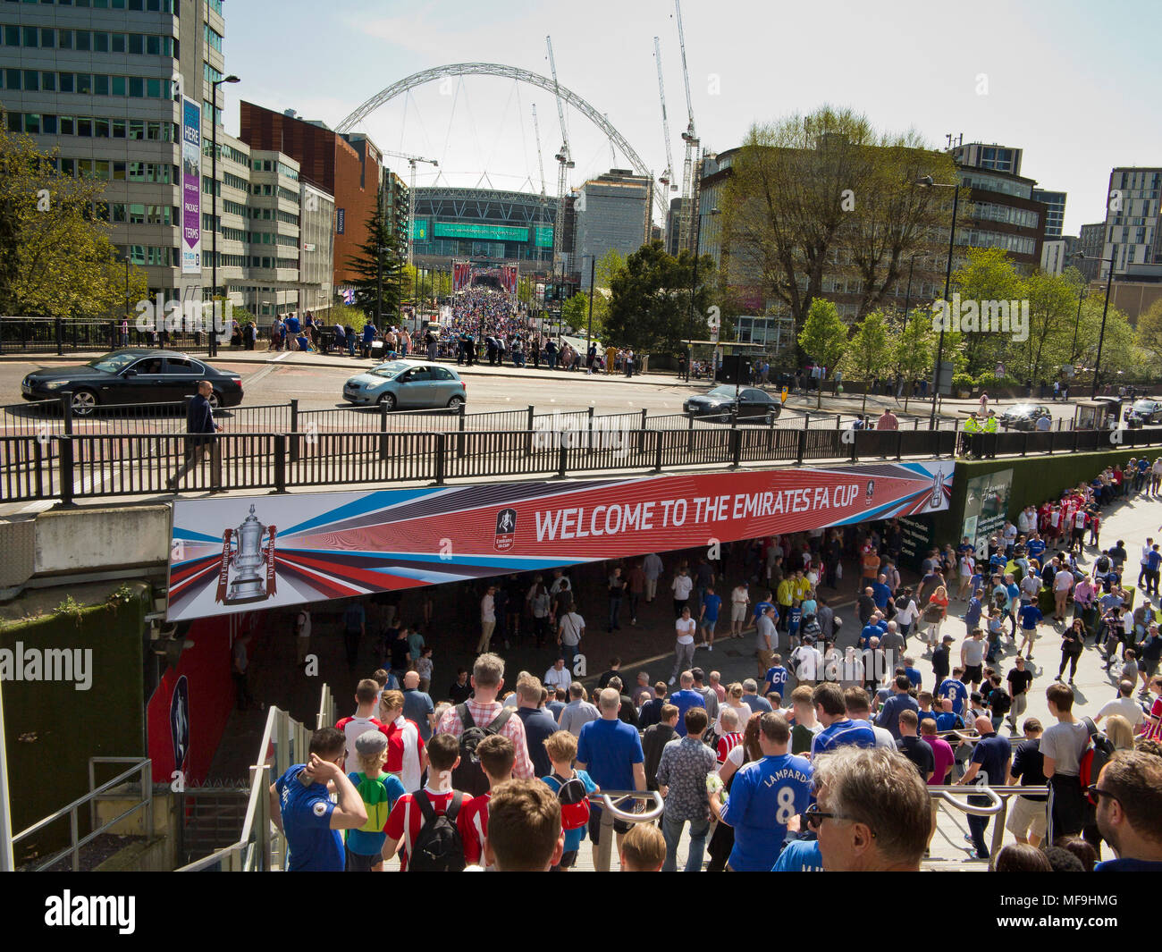 22/4/2018 Wembley, London, UK   Football fans accumulate around the famous Wembley Stadium  on Empire Way, on their way to the FA Cup Semi-Final. Stock Photo