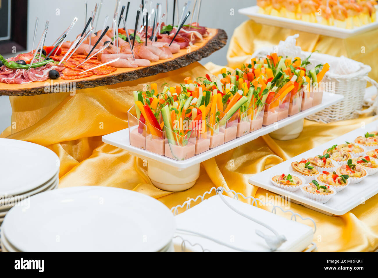 Catering table with dishes and snacks on the business event in the