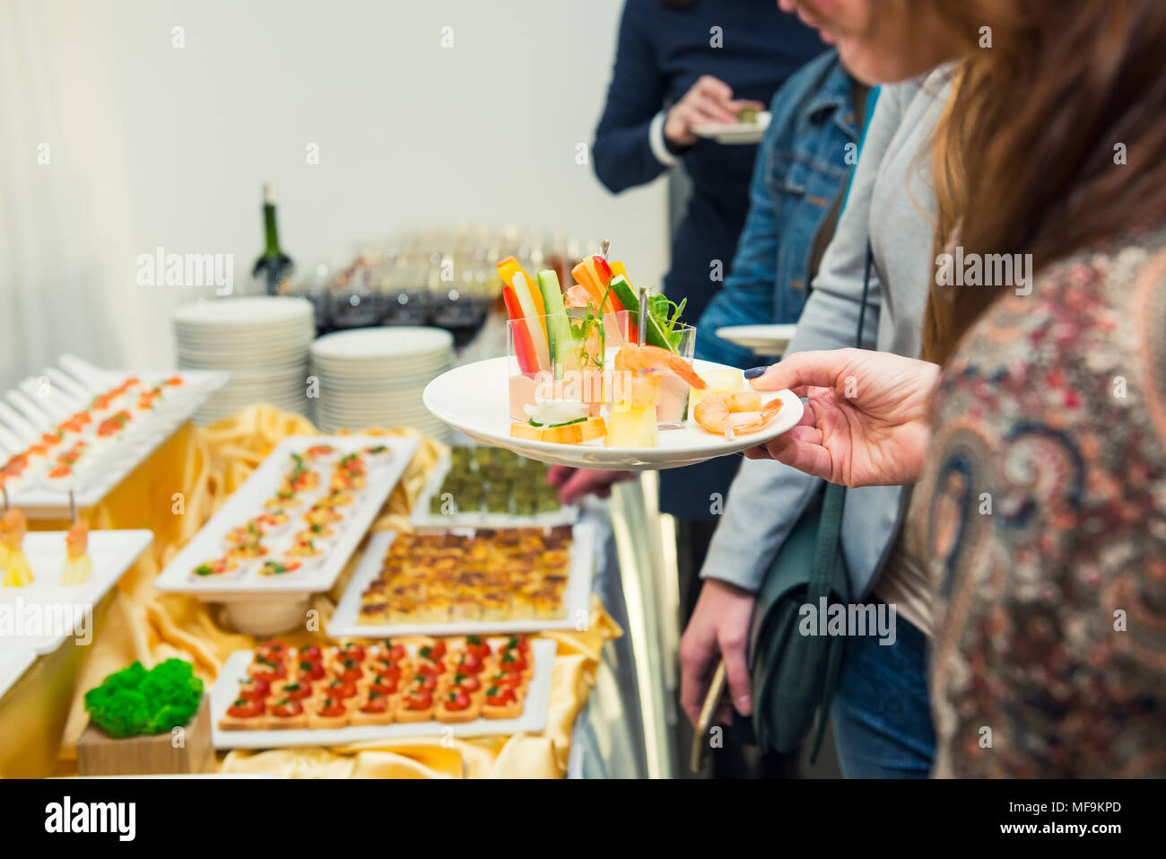 Catering buffet table with food and snacks for guests of the event