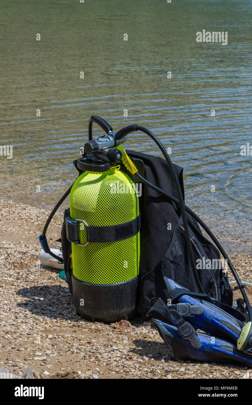 Full set of scuba diving equipment on the ground next to a sea coast Stock Photo Alamy