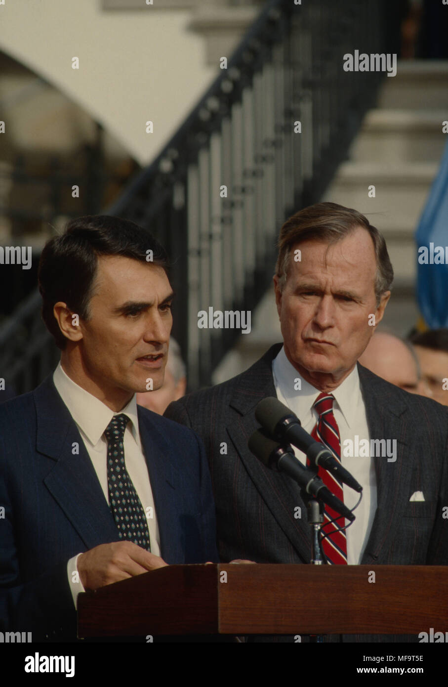 President George H.W. Bush and Prime Minister of Portugal Anibal Cavaco Silva deliver remarks at the podium outside the South Portico diplomatic entance as the conclusion of the Mr. SIlvas's visit to the White House Credit: Mark Reinstein/MediaPunch Stock Photo