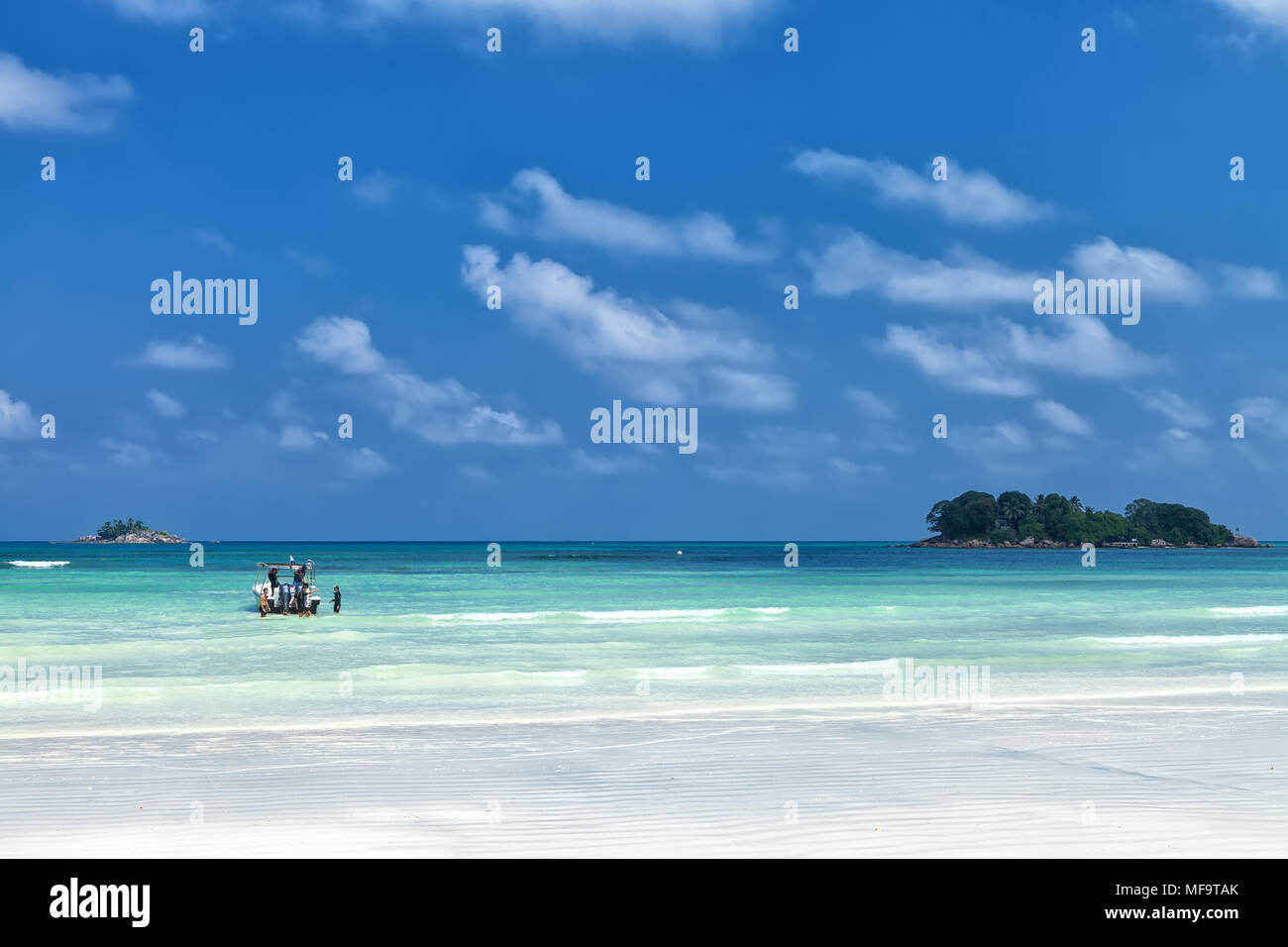 White coral sand on tropical beach. Praslin island, Seychelles Stock Photo