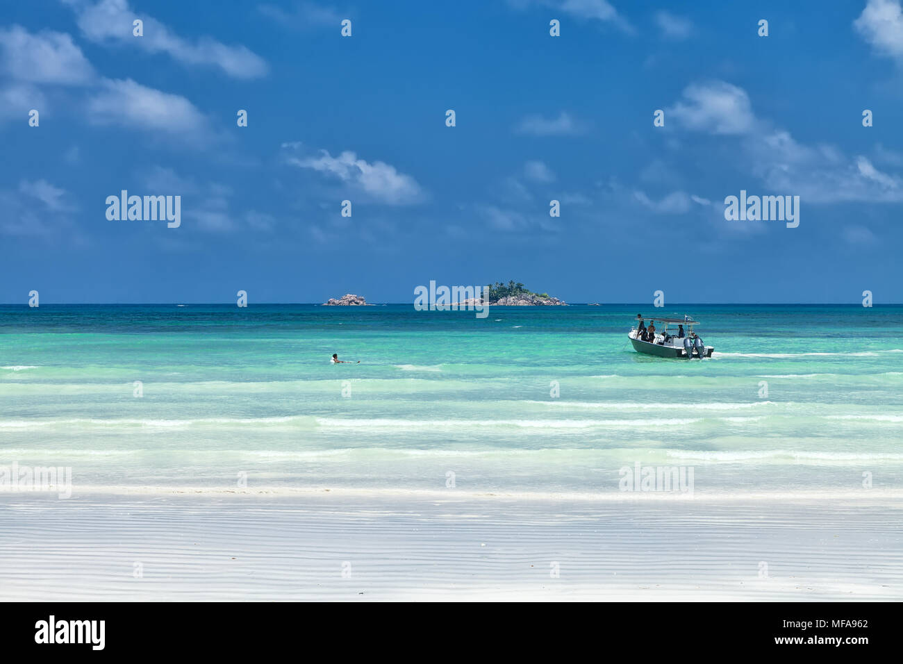 White coral sand on а tropical beach. Praslin island, Seychelles Stock Photo