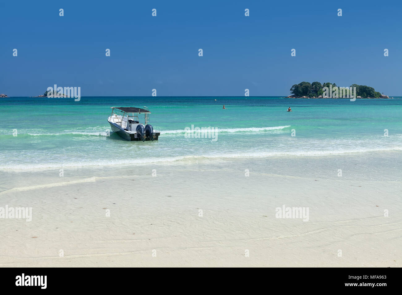 White coral sand on а tropical beach. Praslin island, Seychelles Stock Photo