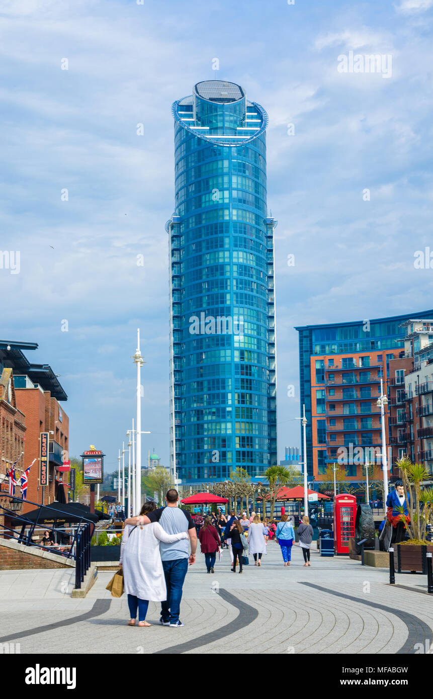 A view of the lipstick tower, a modern, glass skyscraper at Gunwharf