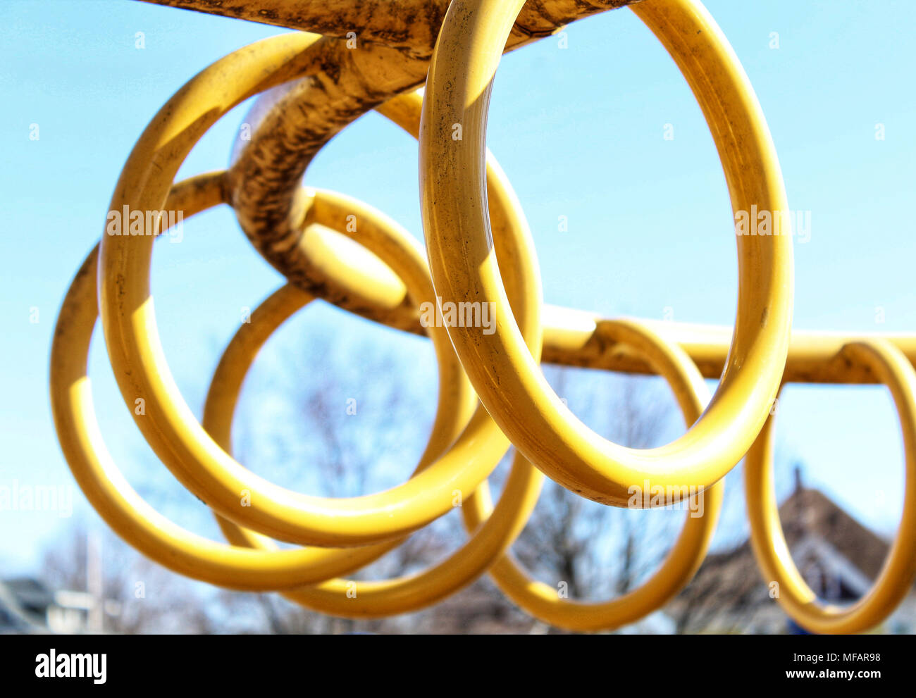 Monkey Bar Rings in a loop At The Park for climbing On A Sunny Day Stock  Photo - Alamy