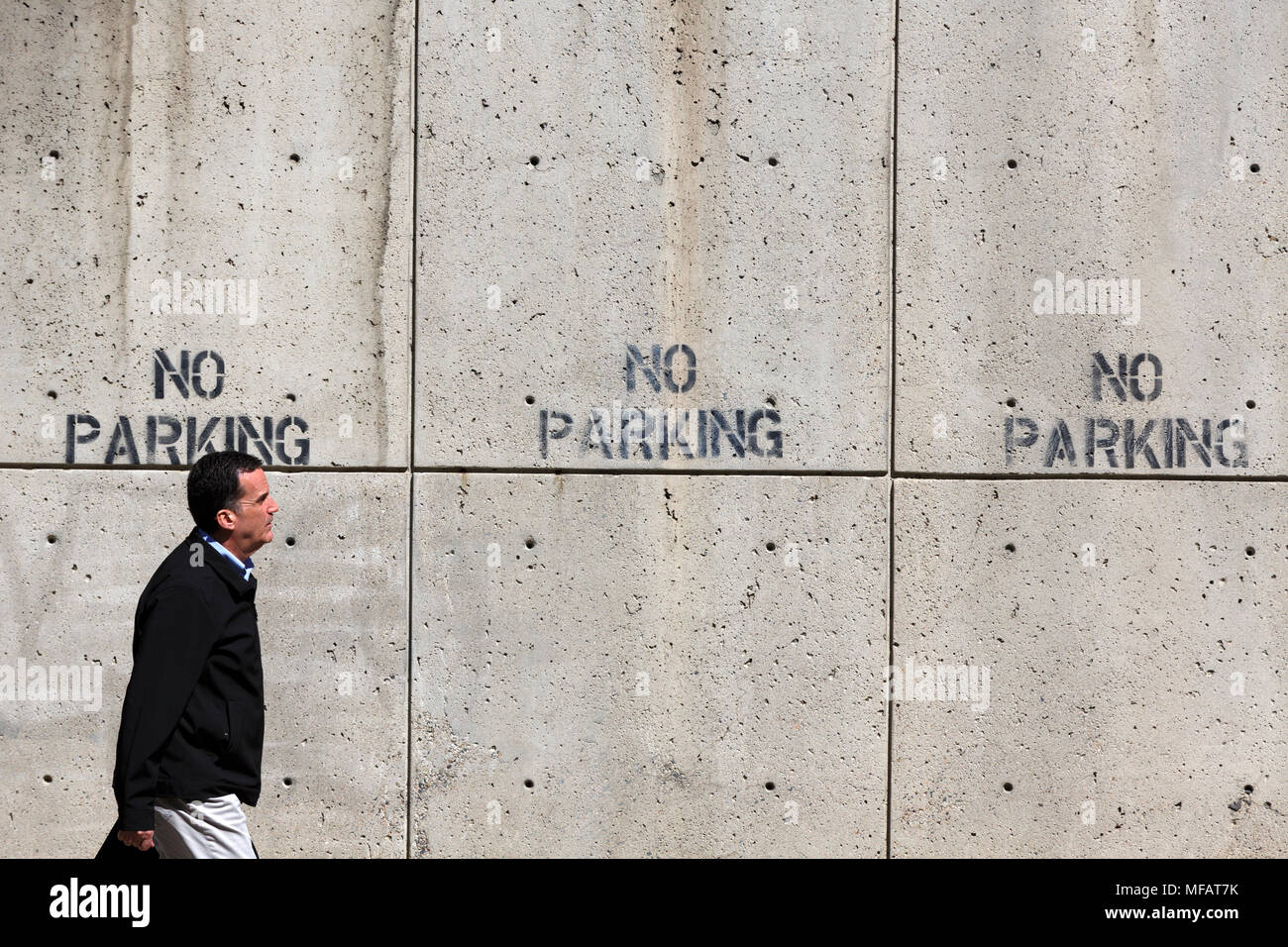 Concrete wall, no parking, pedestrian, Boston Massachusetts USA Stock Photo