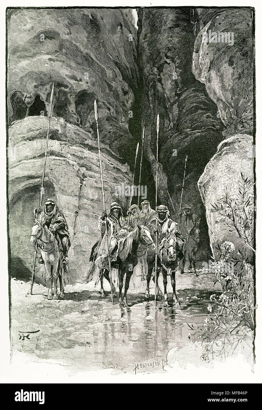 Engraving of armed and mounted bedouins in the Khuzneh Gorge near Petra. From an original engraving in the 1891 edition of In Scripture Lands by Edward L Wilson Stock Photo