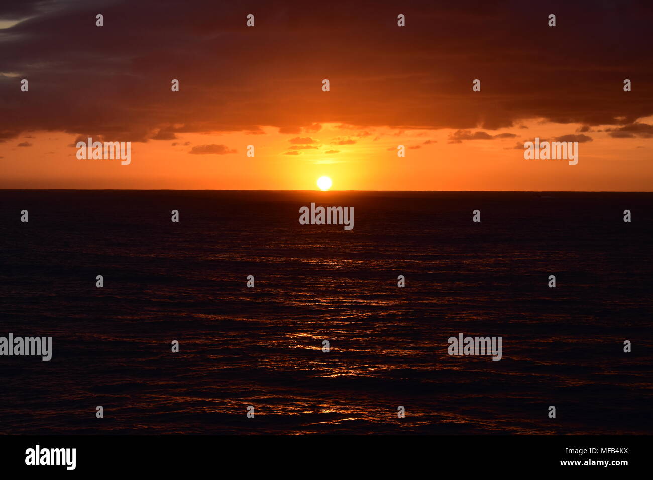 The Sunrise Over The Ocean Stock Photo - Alamy