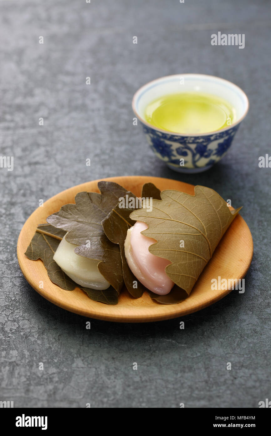 kashiwa mochi is white mochi surrounding a sweet anko filling with a