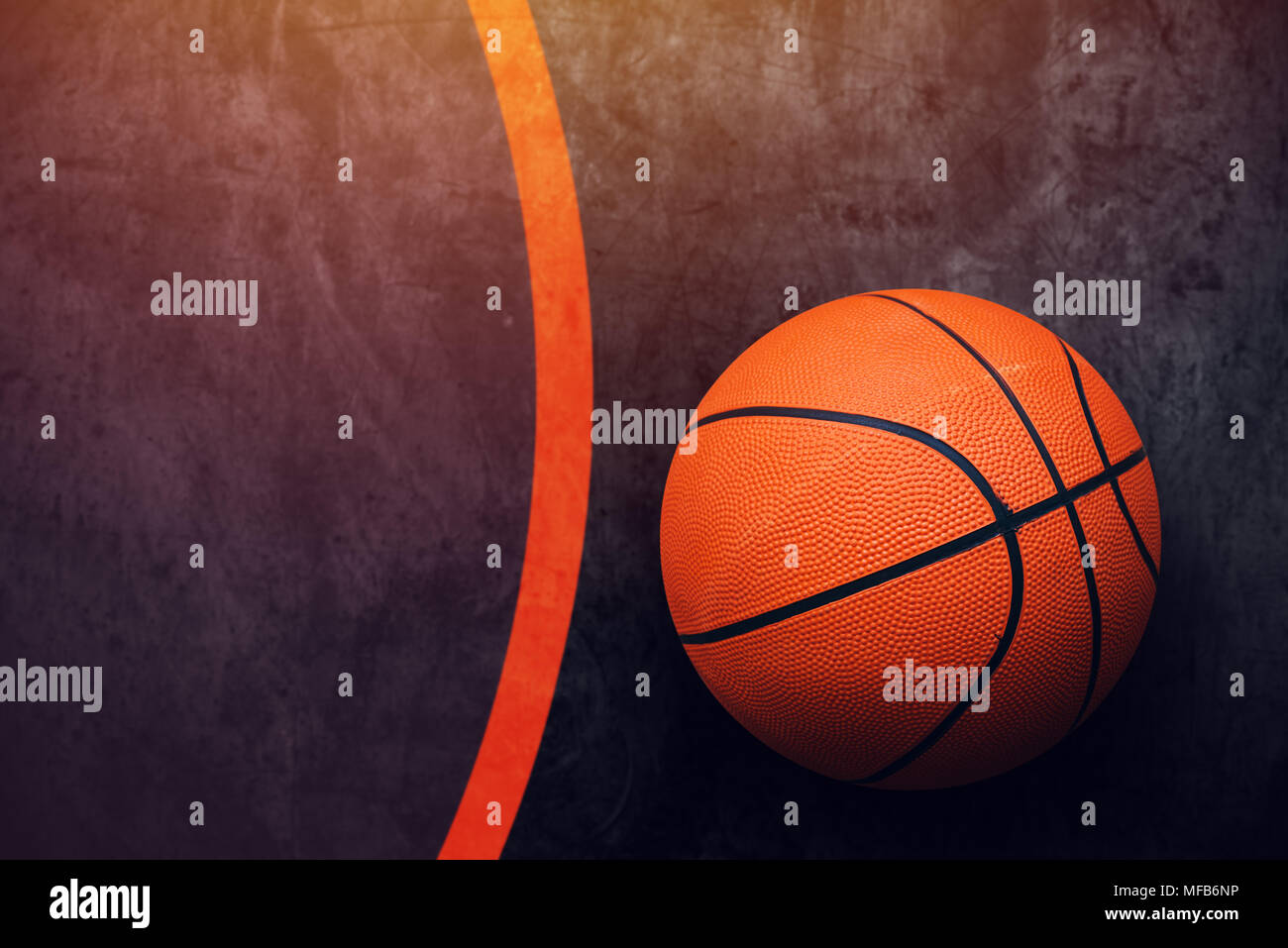 Streetball concept with basketball ball and copy space on dark concrete  surface, top view Stock Photo - Alamy