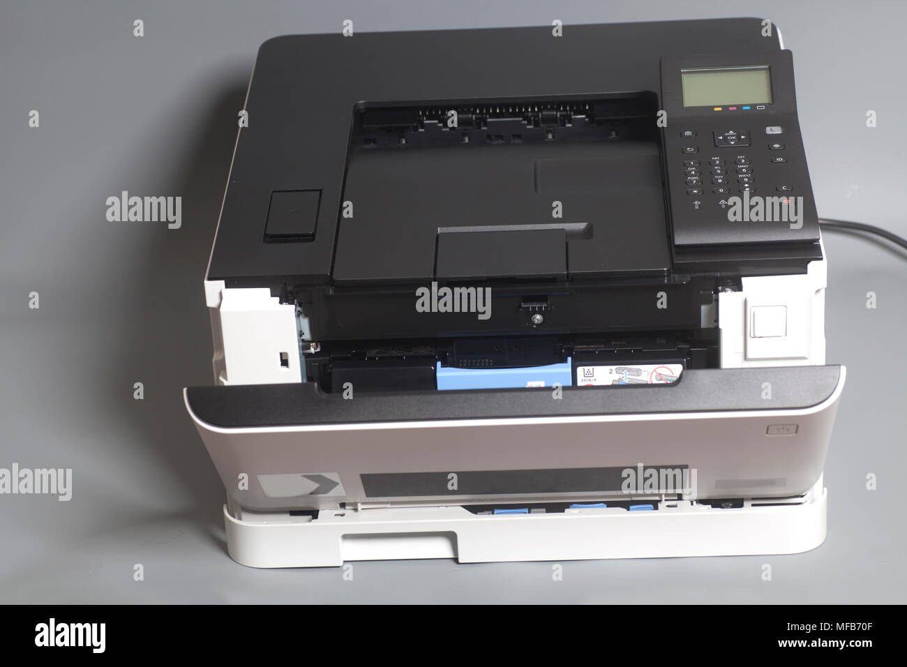 Laser color printer on gray background Stock Photo Alamy
