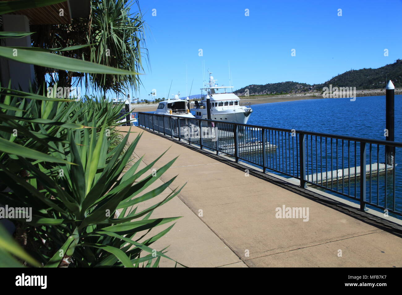 Nelly Bay marina, island Stock Photo Alamy