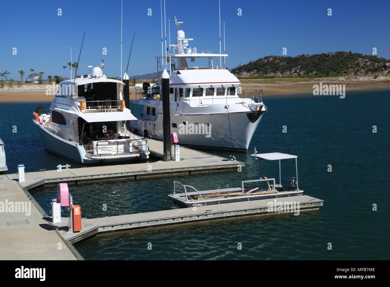 Nelly Bay marina, island Stock Photo Alamy