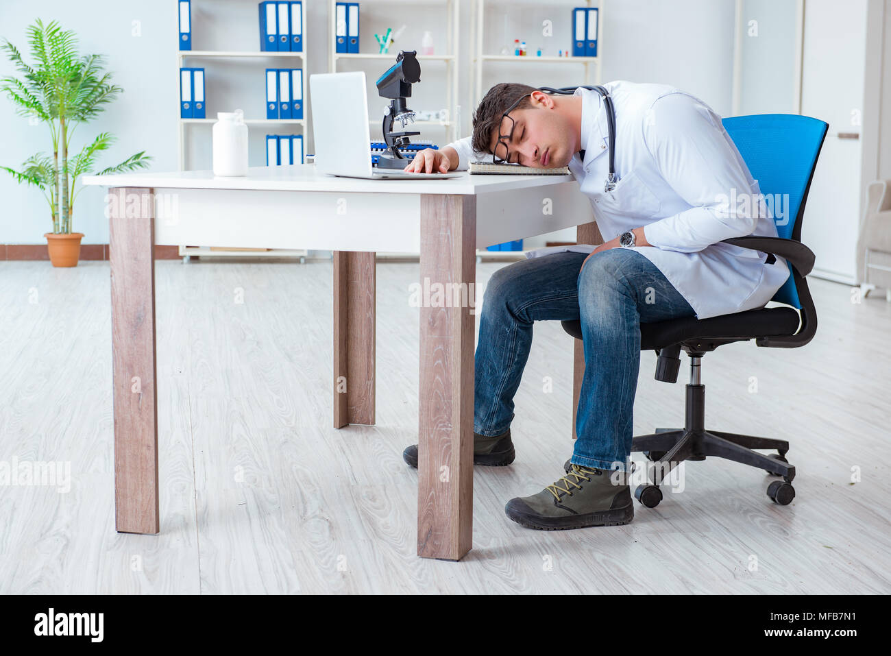 Tired doctor after night shift Stock Photo Alamy