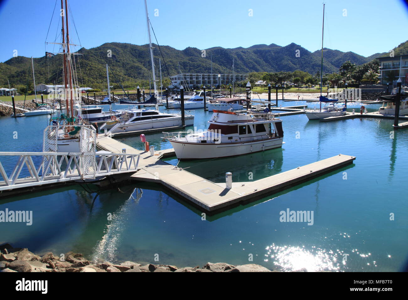 Nelly Bay marina, island Stock Photo Alamy