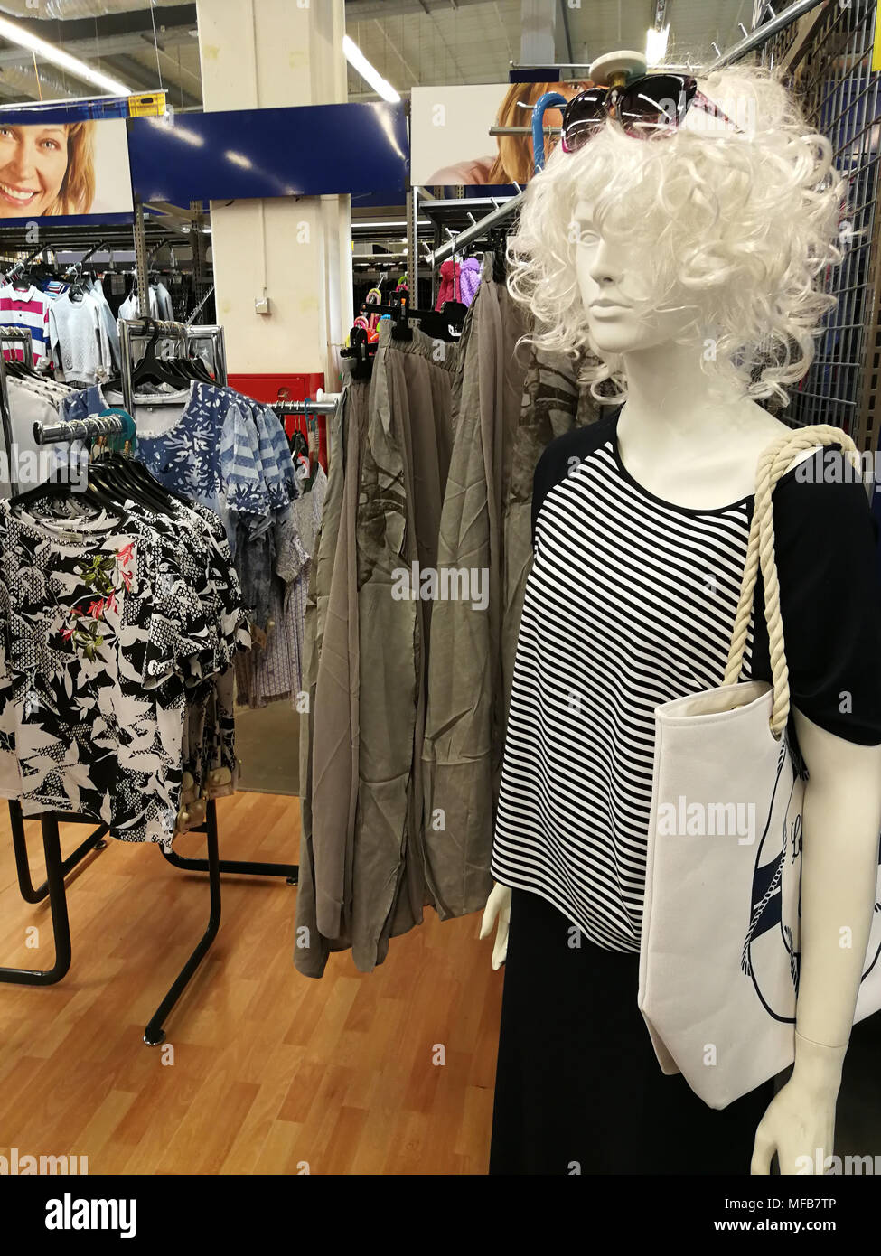 The women's mannequin inside the shopping center demonstrates the latest fashions. Stock Photo