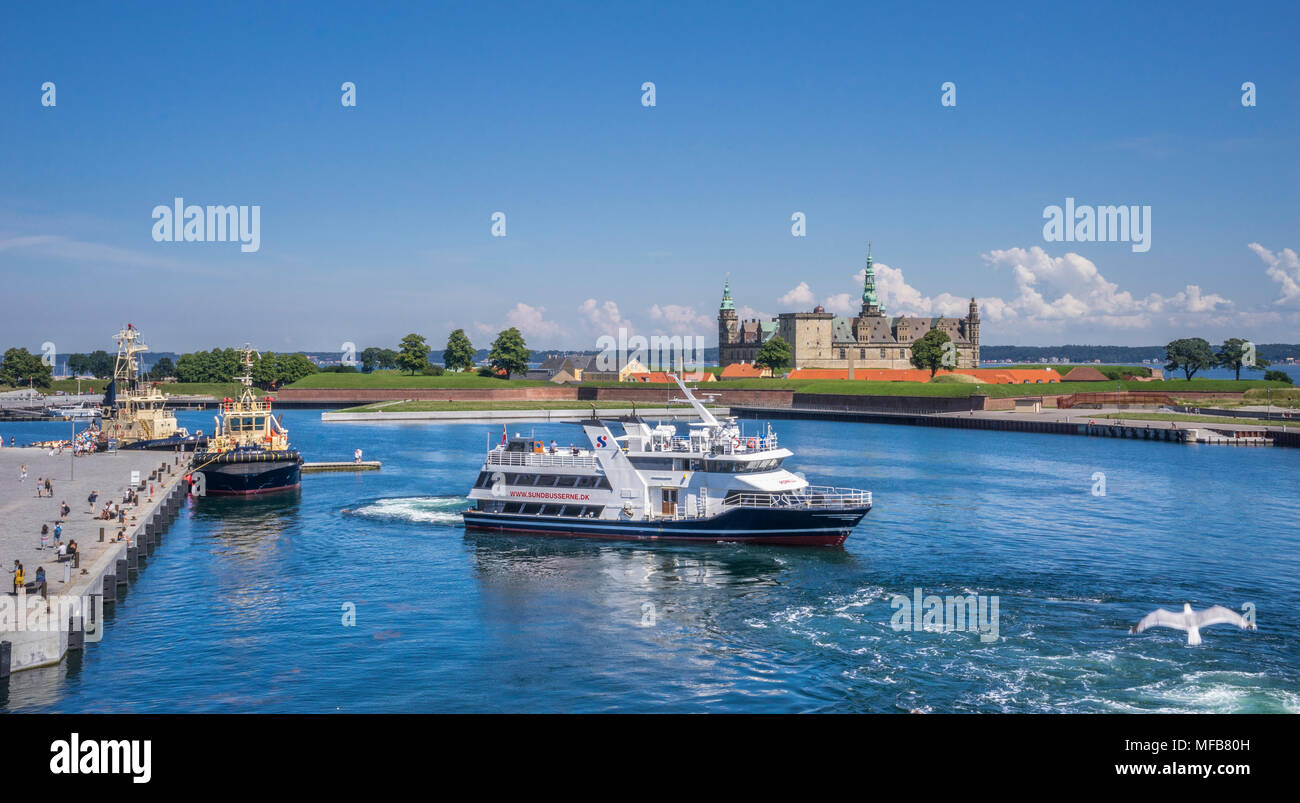 Port of Helsingør, Øre Sound passenger ferry 'MS Permille' against the backdrop of Kronborg Castle, Zealand, Denmark Stock Photo