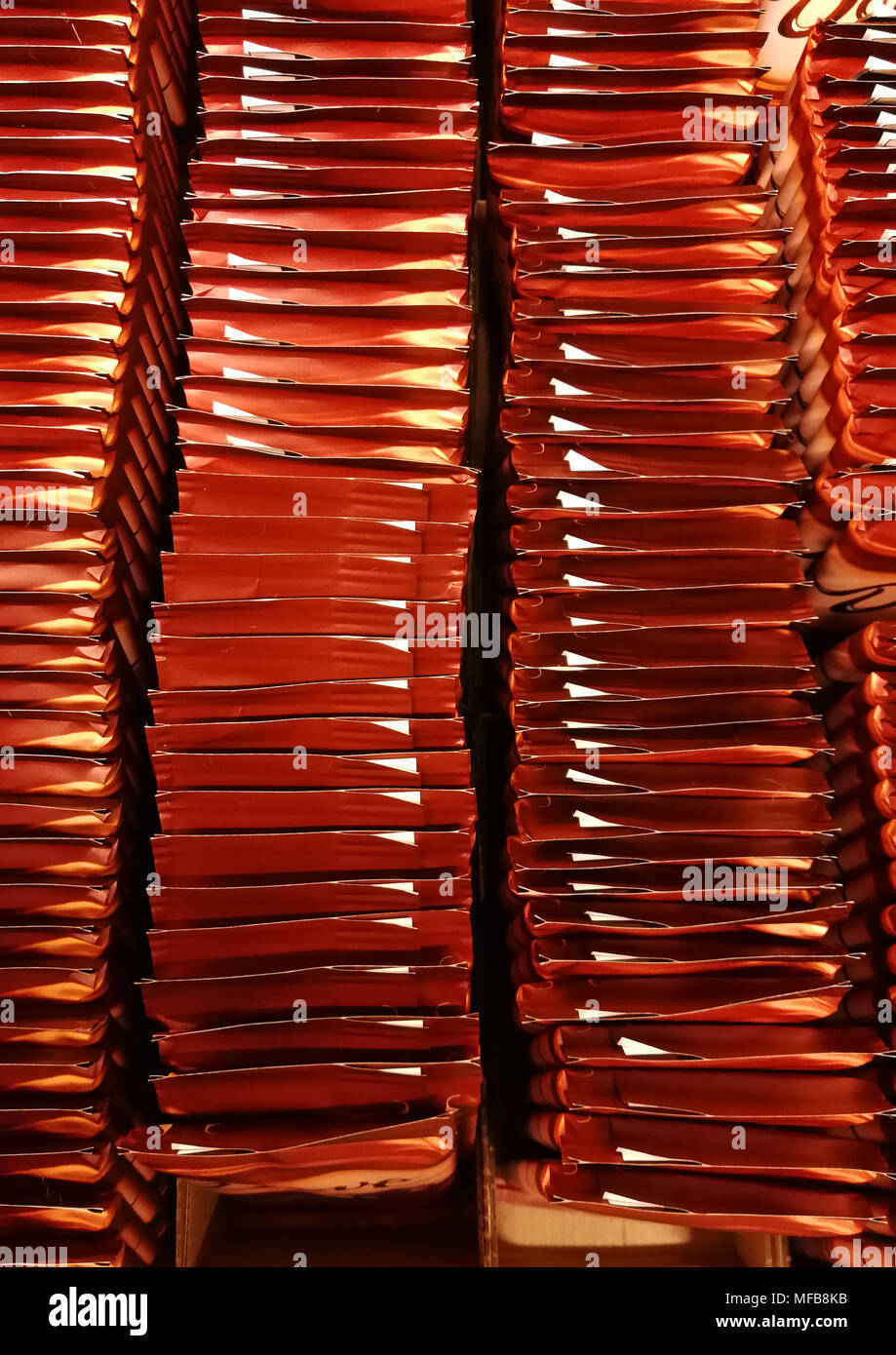 The view from the top. Many colorful rows of chocolates in one package. Stock Photo