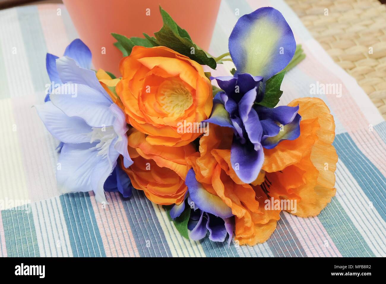 Bunch of Artificial Orange Ranunculus Flowers with Blue Flowers for