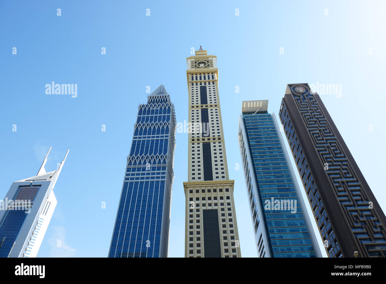 DUBAI, UAE - NOVEMBER 19: The Emirates Towers and skyscrapers on November 19, 2017. The Emirates Towers complex is set in over 570,000 m2 Stock Photo