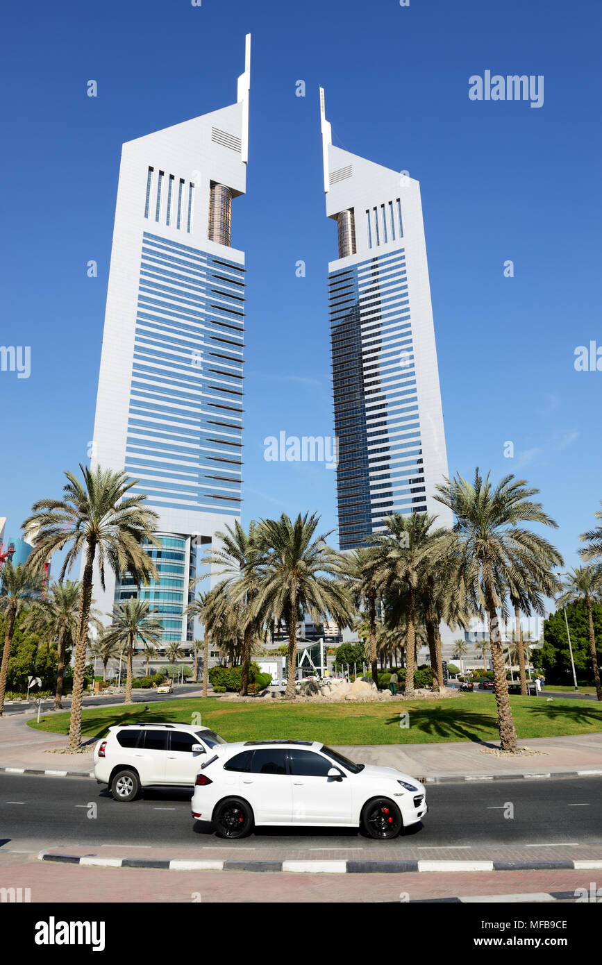 DUBAI, UAE NOVEMBER 19 The Emirates Towers, Porsche Cayenne SUV on