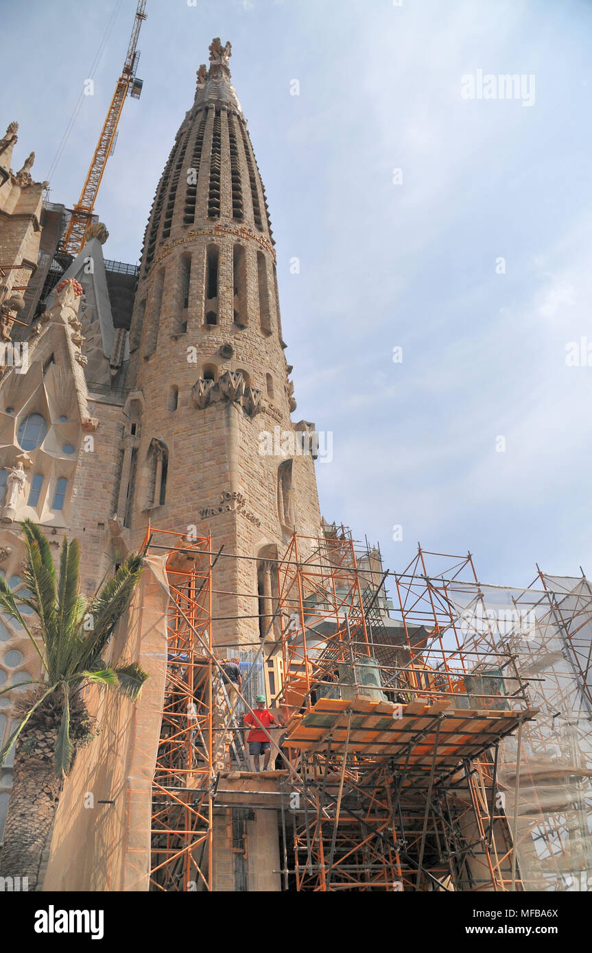 Cranes and scaffolding surround the building of the Sagrada Família Church in its ongoing construction in Barcelona, Spain. Stock Photo