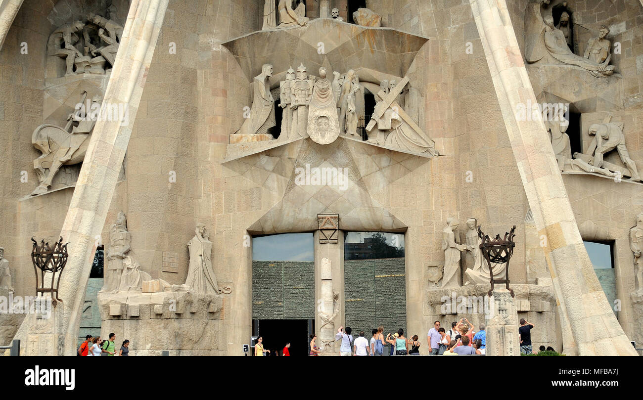 Main entrance to the church of Sagrada Família in Barcelona, surrounded by sculptings  of the  life of Christ. Stock Photo