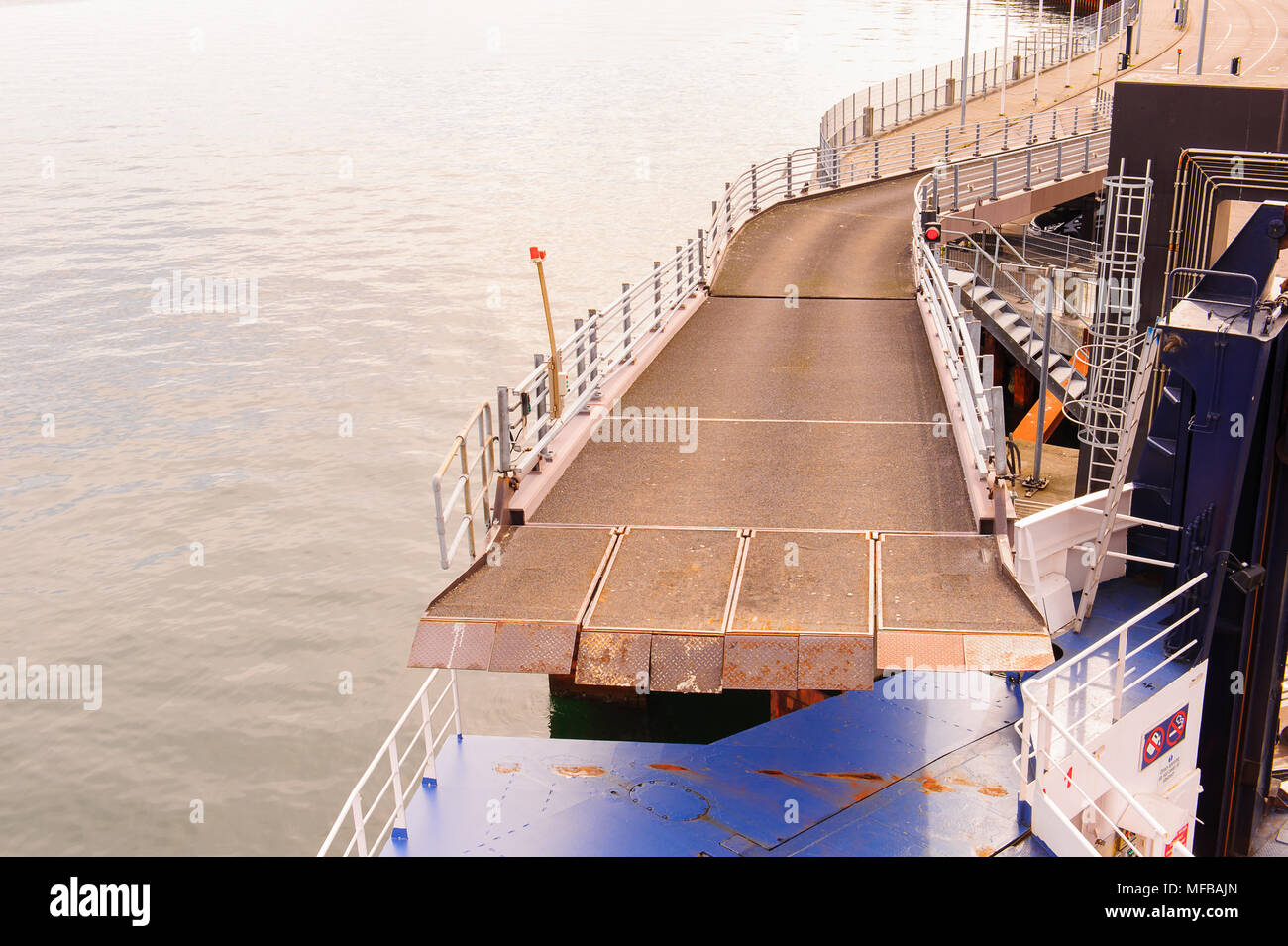 Road for transport of vehicles over the ship to cross the strait Stock Photo