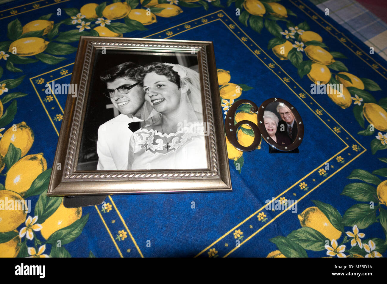 Wedding picture next to a current photograph celebrating sixty years of marriage. Downers Grove Illinois IL USA Stock Photo