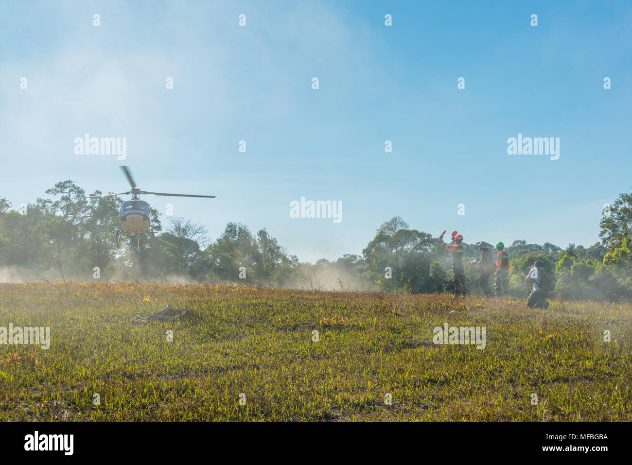 Nakhon Ratchasima, Thailand - December 23, 2017: Helicopter landing to carry injured passenger to hospital in rescue drill on simulation of passenger  Stock Photo