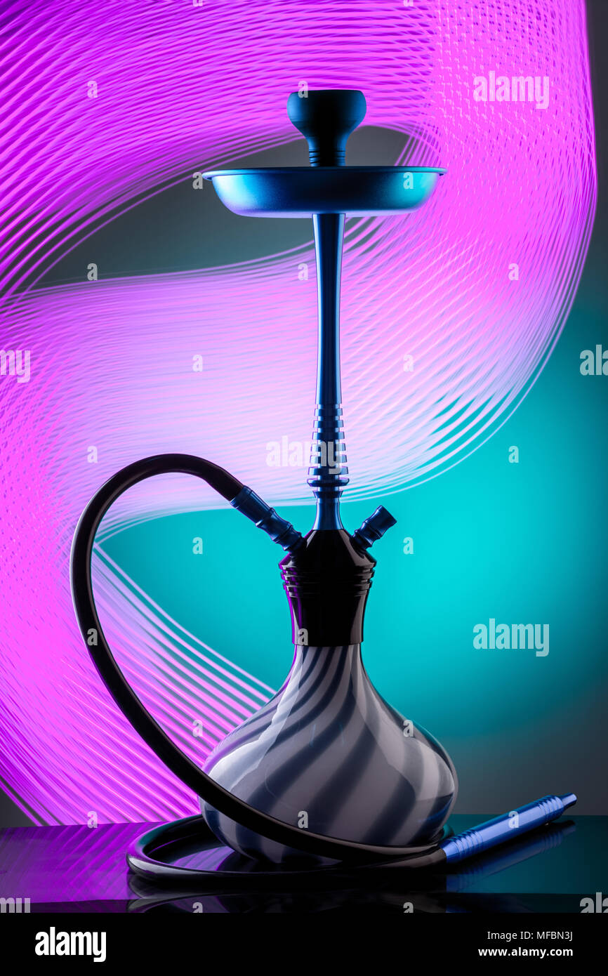 Blue eastern hookah on colorful background Stock Photo Alamy
