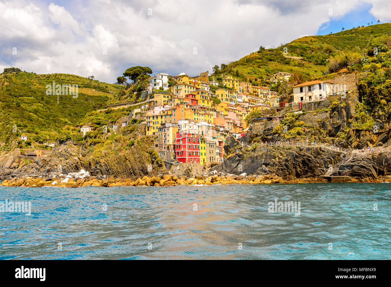 Beautiful sea view of Riomaggiore (Rimazuu), a village in province of La Spezia, Liguria, Italy. It's one of the lands of Cinque Terre, UNESCO World H Stock Photo