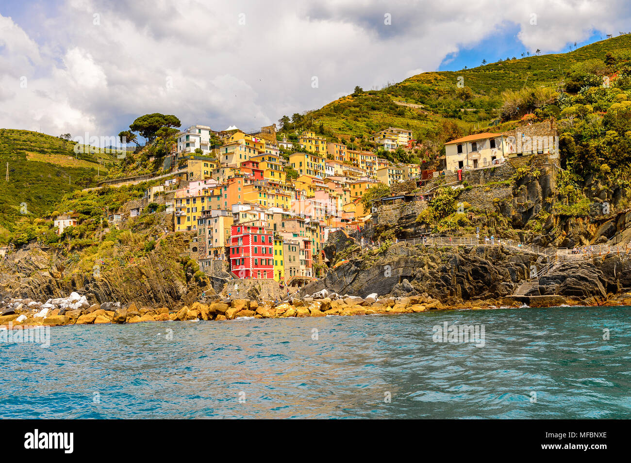 Beautiful sea view of Riomaggiore (Rimazuu), a village in province of La Spezia, Liguria, Italy. It's one of the lands of Cinque Terre, UNESCO World H Stock Photo